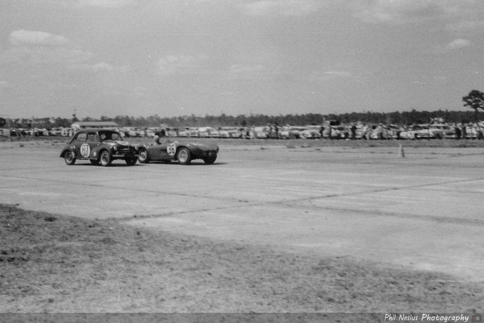 Maserati 300S Number 36 driven by Valenzano / Perdisa and a Renault 4CV Number 87 driven by Pons / Manzon / Hébert at Sebring March, 13 1955 ~ 114L_0011 ~ 