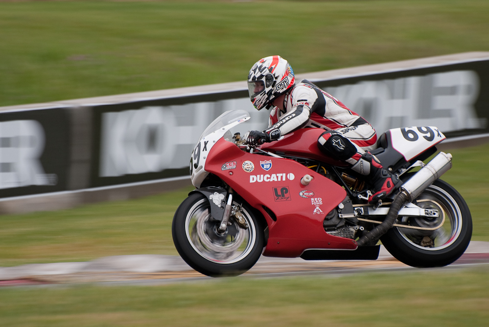 Daniel Burns on a Ducati No 69X in turn 7, Road America, Elkhart Lake, WI
