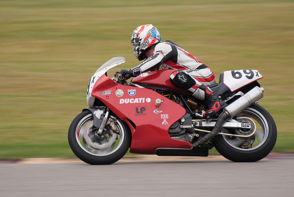 Daniel Burns on a Ducati No 69X in the bend, Road America, Elkhart Lake, WI
