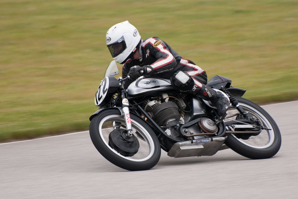 Alex Mclean riding a 1961 Norton, No 122 in the bend, Road America, Elkhart Lake, WI 