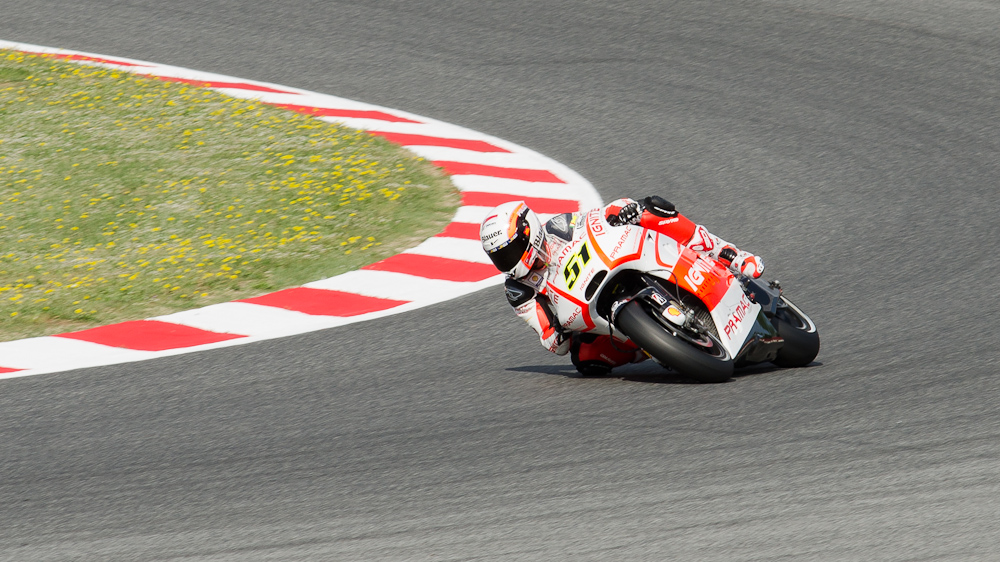 Michele Pirro on the #51 Pramac Racing Team Ducati at Circuit de Catalunya turn 4 / DSC_5091