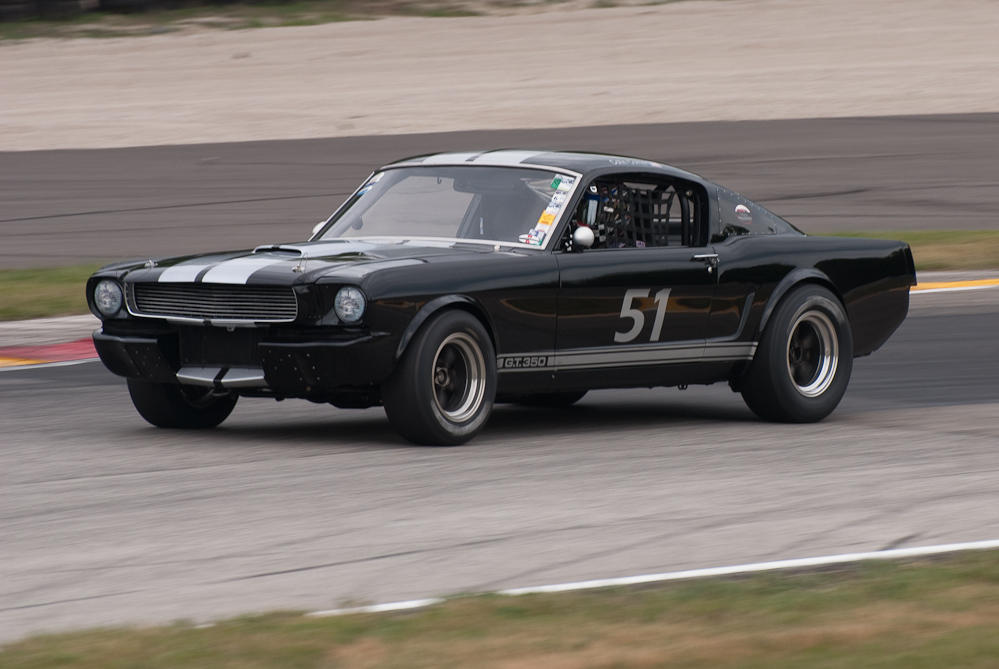 Colin Comer driving a 1966 Shelby GT350 in turn 6 Road America, Elkhart Lake, WI  ~  DSC_0223