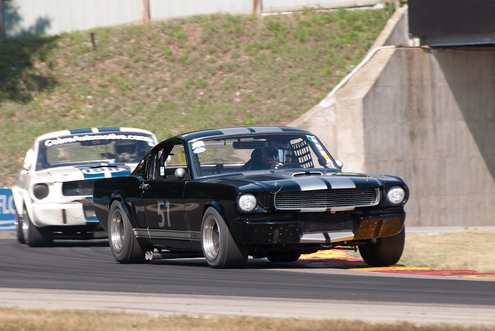 Colin Comer driving a 1966 Shelby GT350 in turn 6 Road America, Elkhart Lake, WI  ~  DSC_0977
