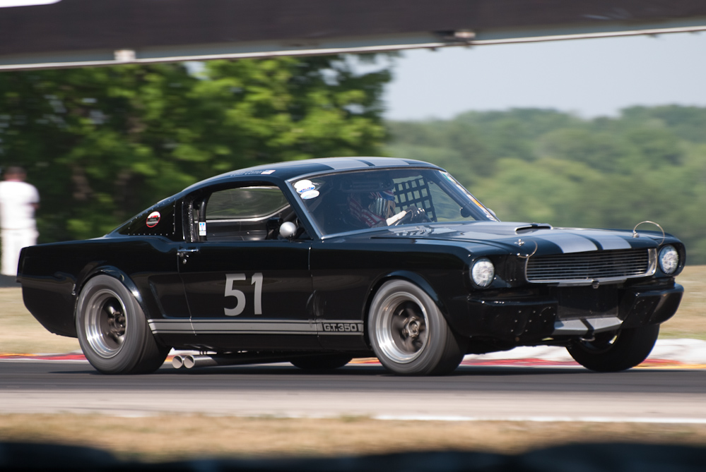 Colin Comer driving a 1966 Shelby GT350 in turn 6 Road America, Elkhart Lake, WI  ~  DSC_0988