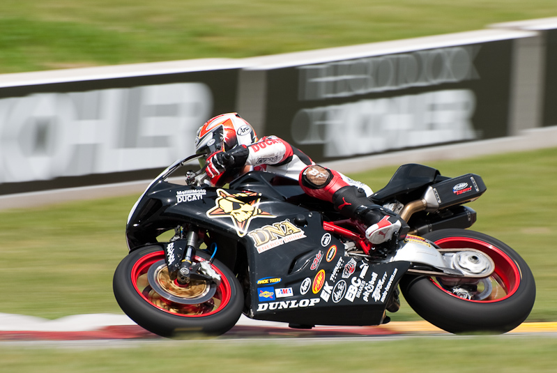 Bobby Fong, No. 30 on the DNA Energy Drink CNR Motorsports Ducati 848 in turn 7, Road America, Elkhart Lake, WI