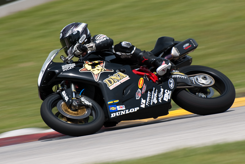 Michael Beck, No. 60 on the DNA Energy Drink CNR Motorsports Ducati 848 in turn 7, Road America, Elkhart Lake, WI