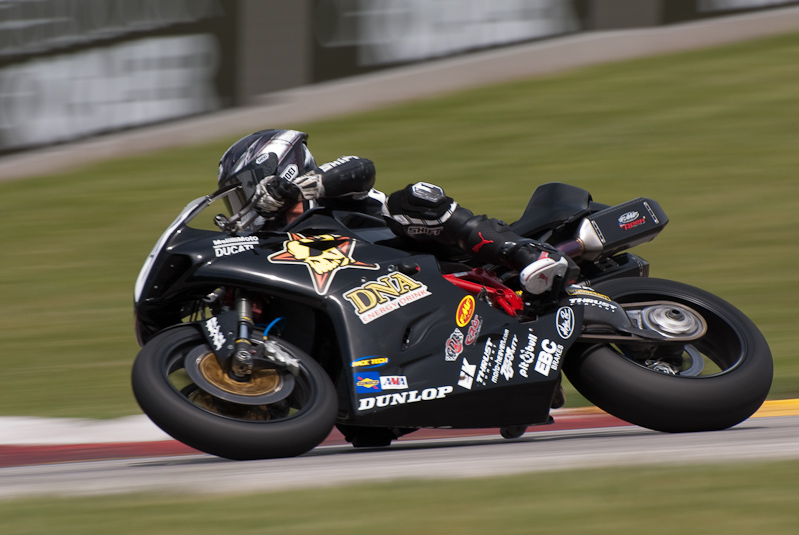 Michael Beck, No. 60 on the DNA Energy Drink CNR Motorsports Ducati 848 in turn 7, Road America, Elkhart Lake, WI