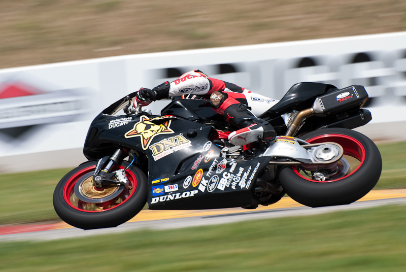 Bobby Fong, No. 30 on the DNA Energy Drink CNR Motorsports Ducati 848 in turn 7, Road America, Elkhart Lake, WI