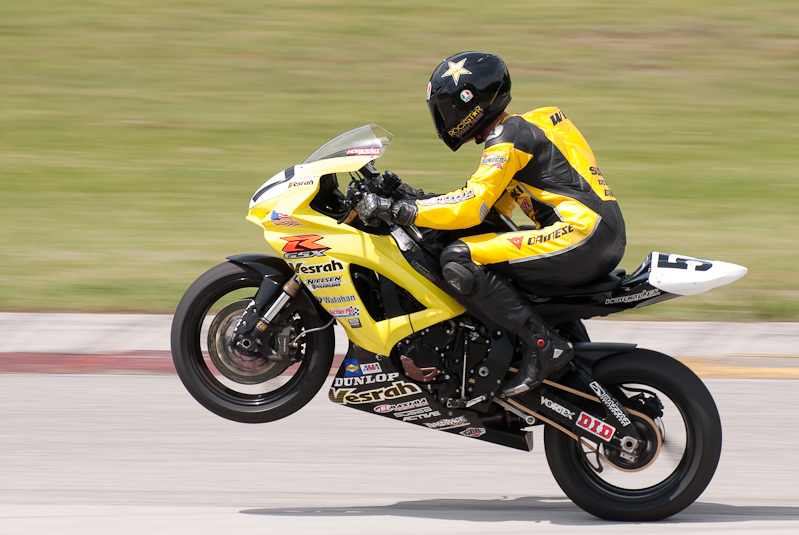 Cory West No, 57 on the Vesrah Suzuki GSX-R600 wheelies out of turn 6, Road America, Elkhart Lake, WI