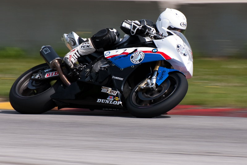 Eric Pinson, No.2 on the Blue Moon Liberty Waves BMW S1000RR in turn 13, Road America, Elkhart Lake, WI