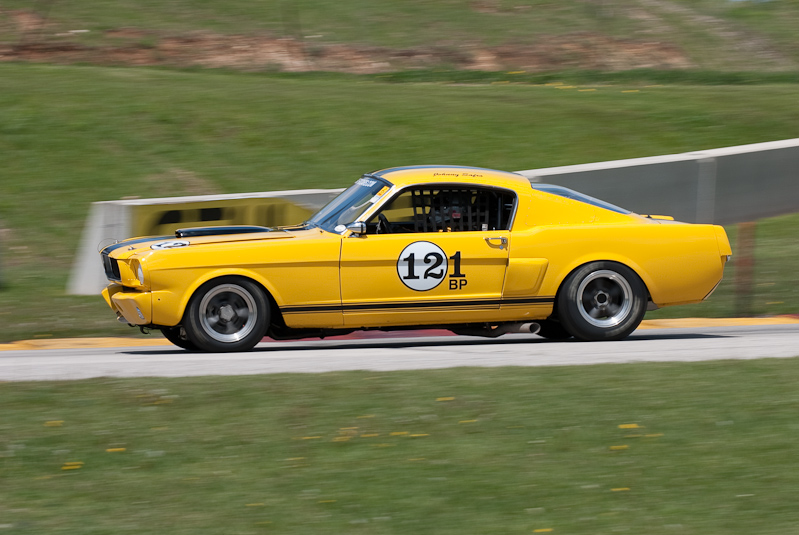 1965 Ford Mustang car# 121 driven by John Safro in turn 7 at Road America, Elkhart Lake, WI