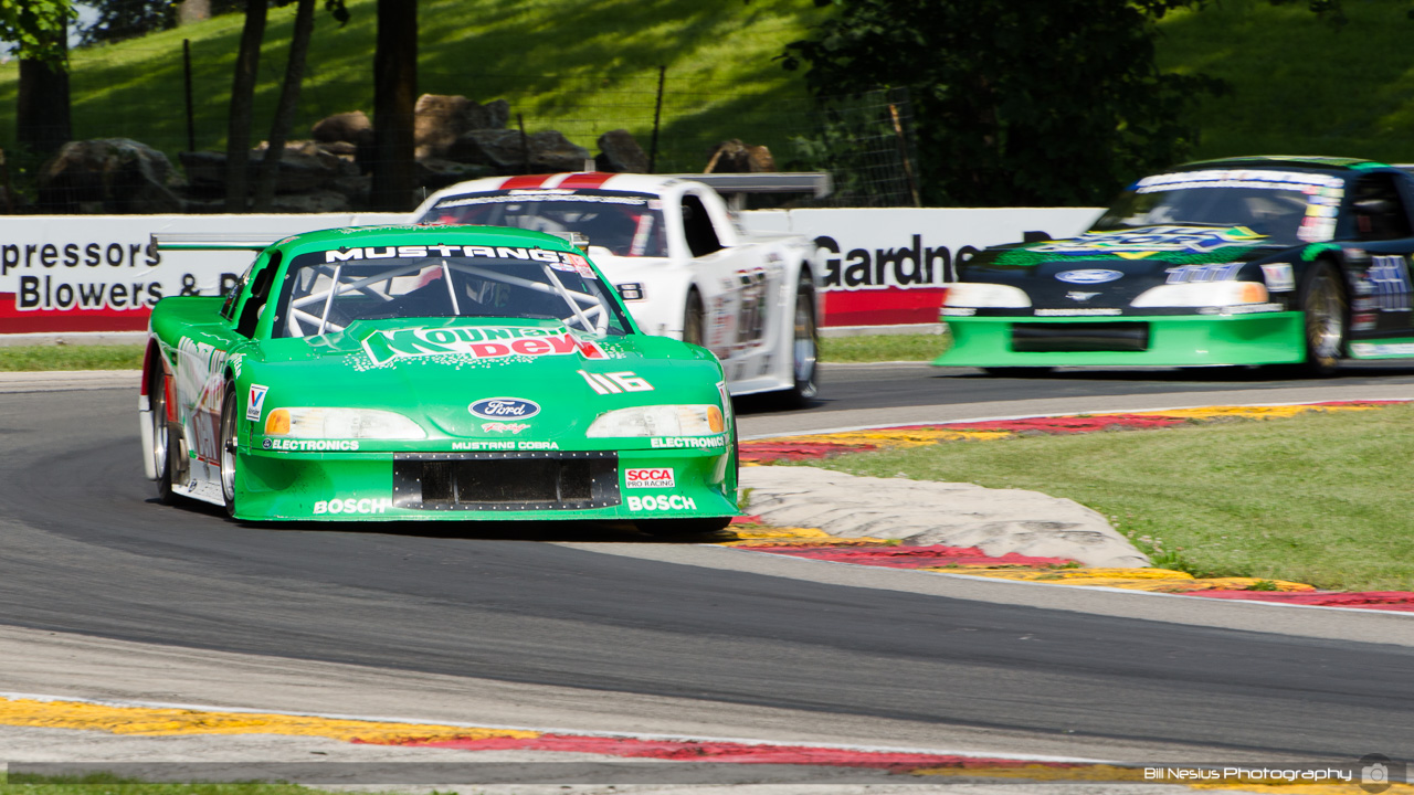 1995 Ford Mustang T/A, #111 driven by Colin Comer at Road America, Elkhart Lkae, WI. turn 6 / DSC_1059