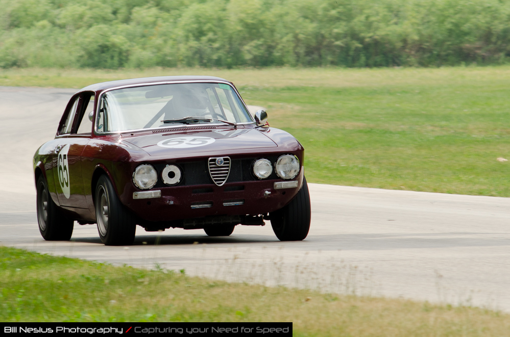 DSC_6940 / 1972 Alfa Romeo GTV driven by Mike Pranka in turn 2-3. Blackhawk Farms Raceway
