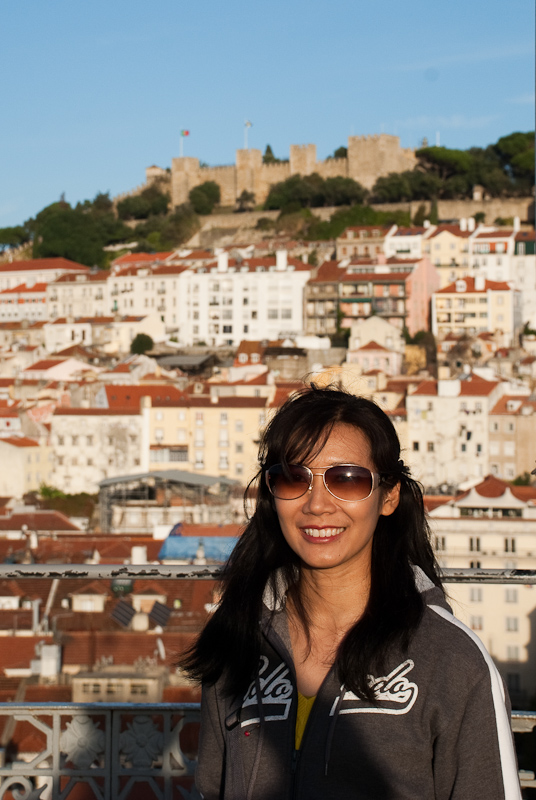 Sutaya from the top of Elevador de Santa Justa with Castelo de Sao Jorge in the background