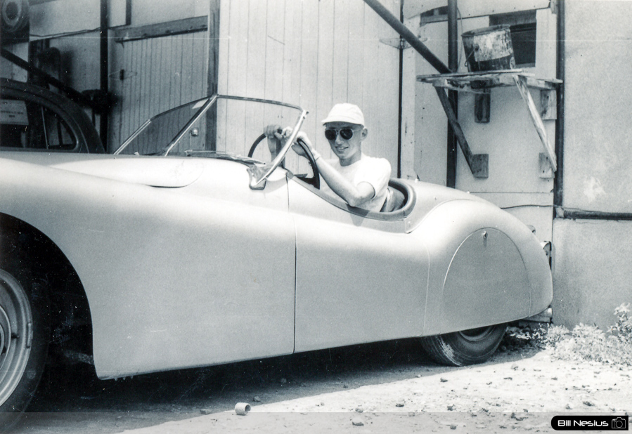 Dad sitting in a Jaguar / 137E_0038 / 