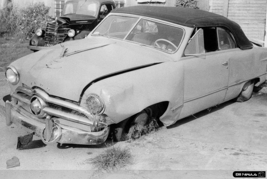 May be a wrecked car they parked outside of base to scare people. / 137E_0044 / 