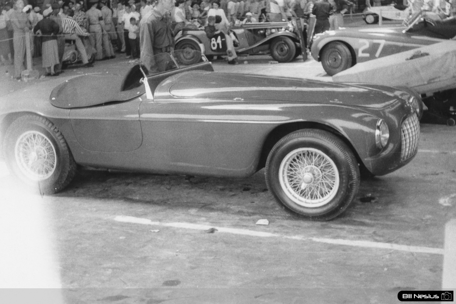 Ferrari 166 MM Touring Spider with tonua cover driven by James Simpson Was running #90 but picture doesn't have a number on it yet at Chanute AFB June, 1953 / 312K_0005 / 