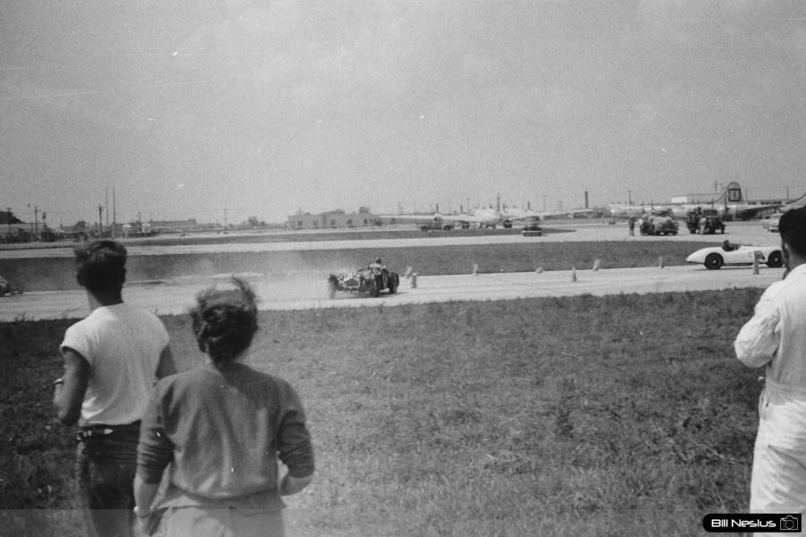 Allard J2  driven by Del Lee and Jaguar XK120 Silverstone number 75 driven by Chuck Leighton at Lockbourne AFB August 1953 / 493K_0010 / 