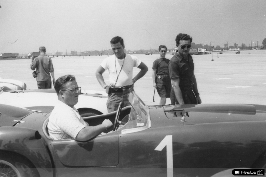 Bill Spear in a 1953 Ferrari 375MM Pininfarina Spyder with Briggs Cunningham in the background Lockbourne AFB August 1954 / 677L_0001 / 